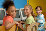 Happyy Children In Daycare With Computers